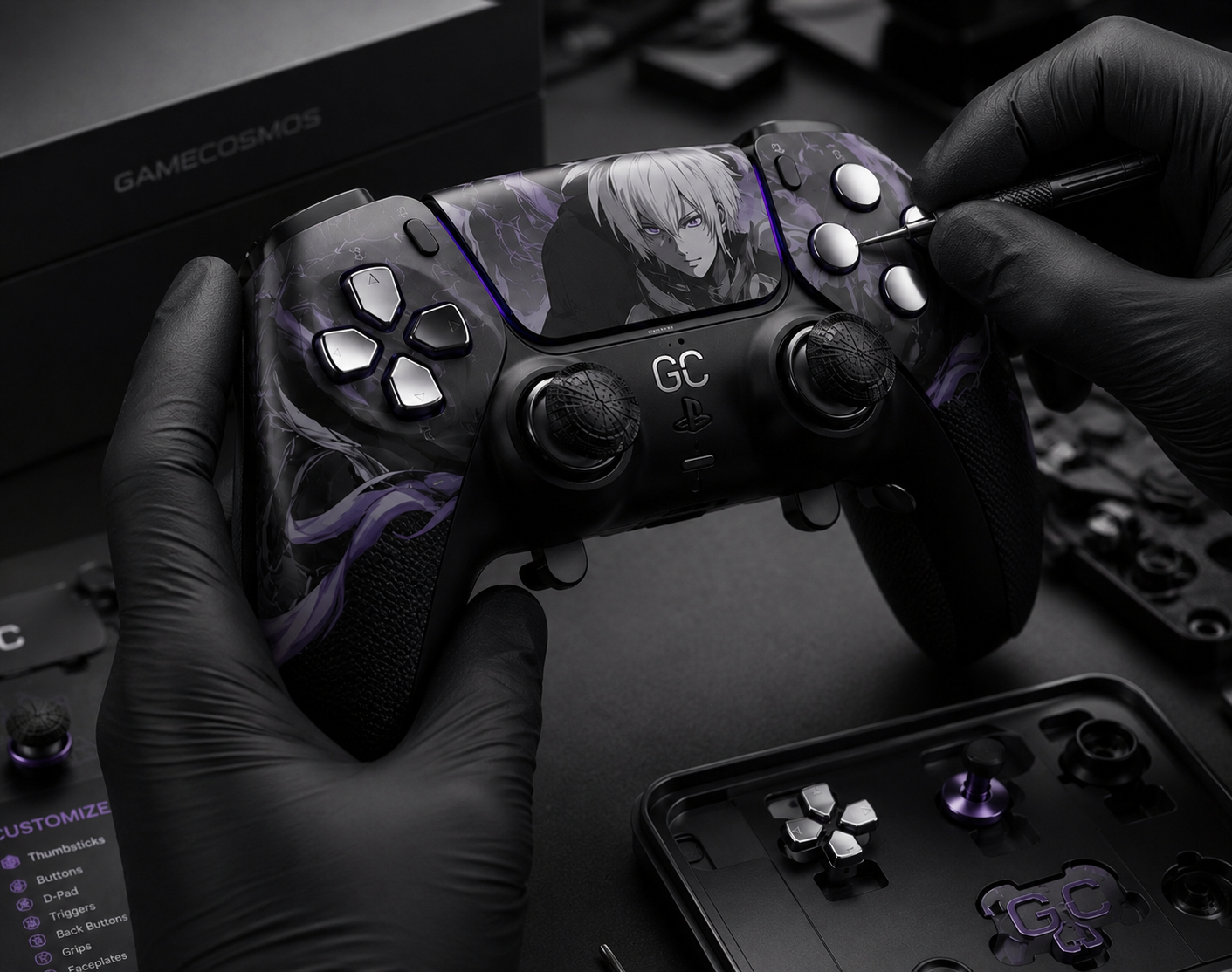 Gloved hands assembling a custom GameCosmos controller with precision tools